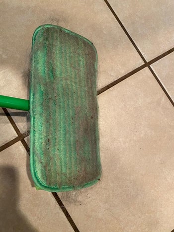 reviewer image showing how much dirt the reusable pad picked up