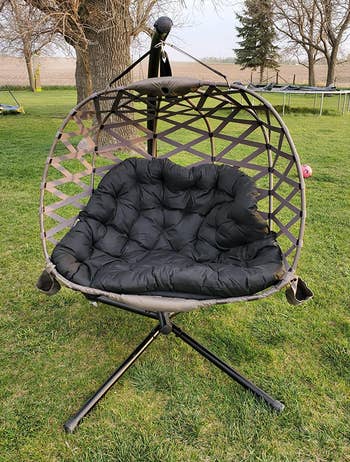 Reviewer image of chair with black cushion