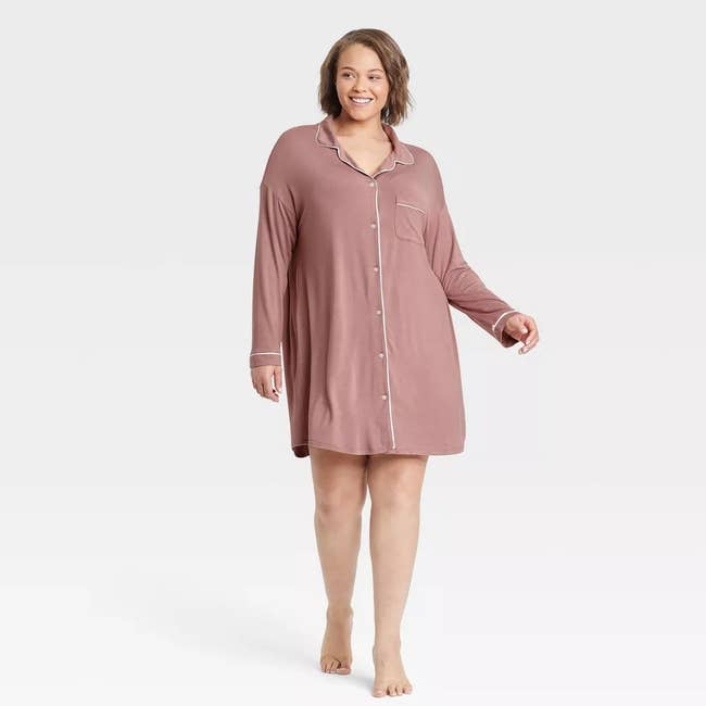 a plus size model wearing the mauve nightgown