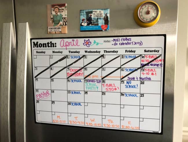 reviewer's dry erase calendar on their fridge totally filled out