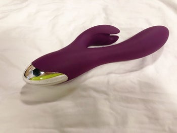 Purple rabbit vibrator on sheets