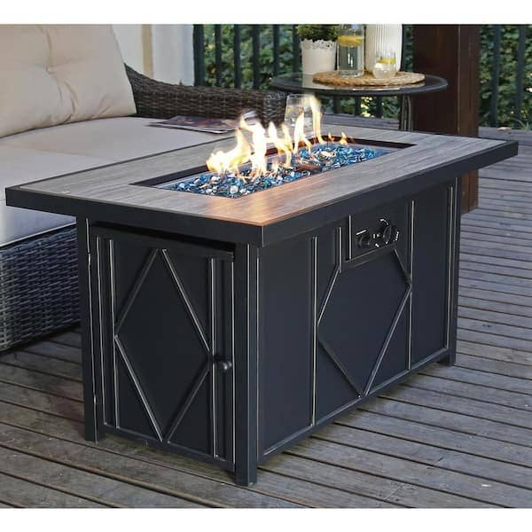 a stylish black tabletop fireplace