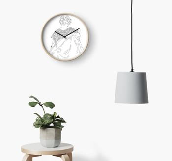 the clock hanging on a wall