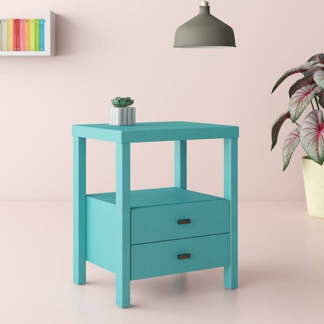 The end table in the color Turquoise