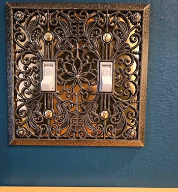 reviewer's double toggle filigree wallplate
