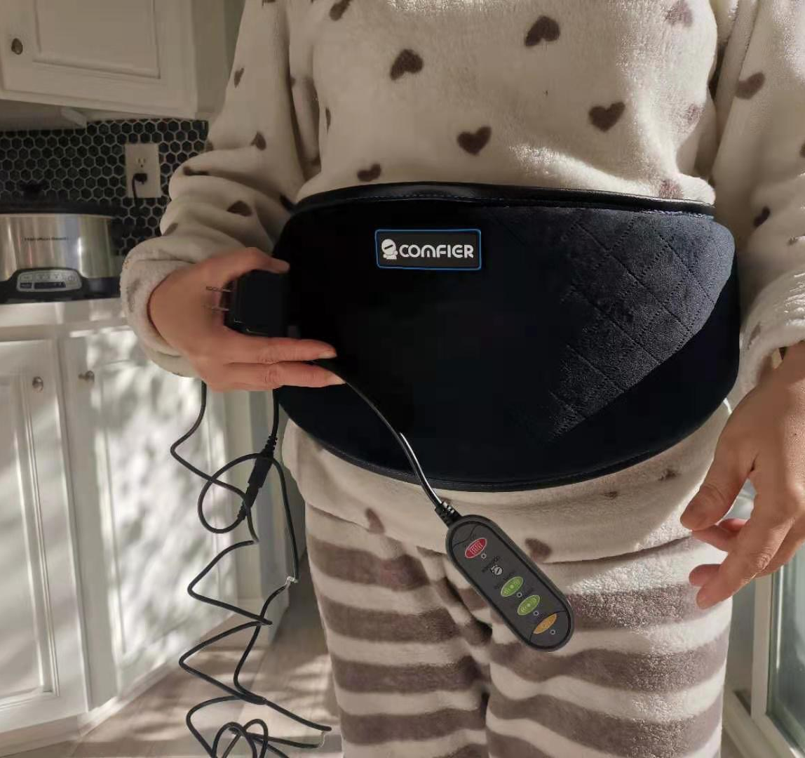 Image of reviewer wearing black heating pad