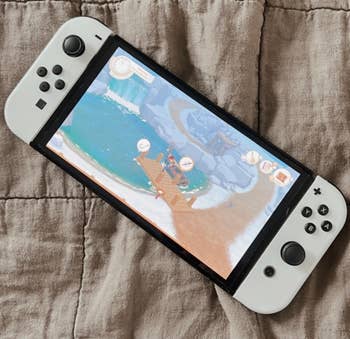 a buzzfeed editor's switch with a cozy game on it