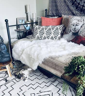 the white faux sheepskin rug on a couch