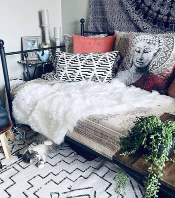 the white faux sheepskin rug on a couch