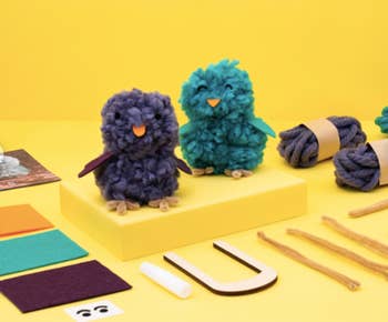 the purple and teal owls with the spools and materials in the kit
