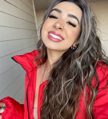 reviewer wearing the forever red color lip stain