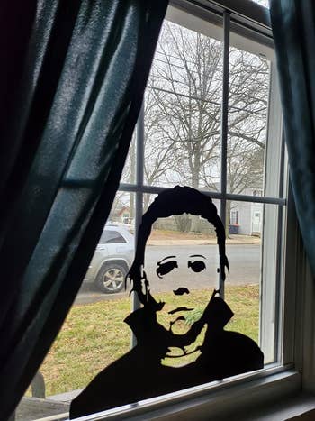 a michael myers decal in a reviewer's window