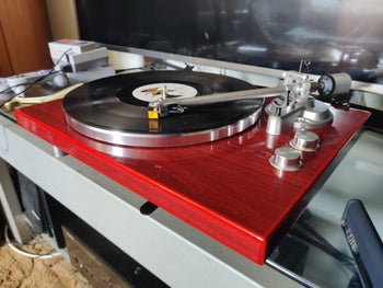 Reviewer image of close up of product with labels next to dials and black vinyl spinning