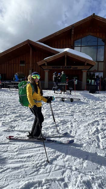 same reviewer but skiing and wearing the backpack