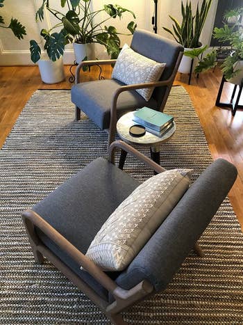 reviewer image of two gray lounge chairs in a living room