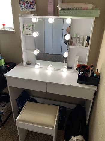 reviewer photo of white vanity in a bedroom