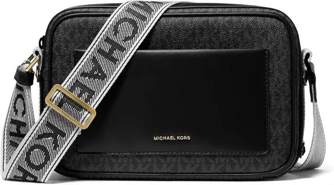 Michael Kors crossbody container  with a salient  logo strap and leather detailing, perfect  for buying  manner  articles