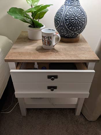 reviewer photo of farmhouse nightstand in a bedroom