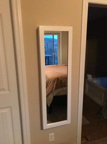 reviewer photo of mirror cabinet mounted on the wall
