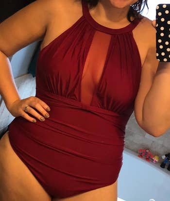a reviewer in the monokini in burgundy 