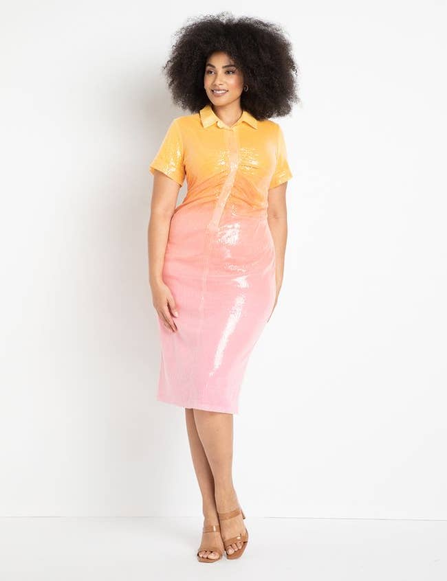 model in short sleeve orange and pink sequined dress