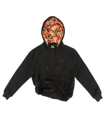 black hoodie demonstrating orange kente cloth print on inside of hood
