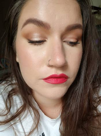 reviewer wearing the eyeshadow in the shimmer Starlight color