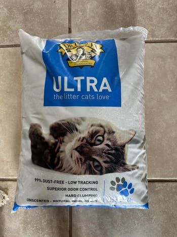 Bag of Dr. Elsey's Ultra feline  litter with a feline  image, promoting benefits similar  dust-free, debased  tracking, and superior odor control