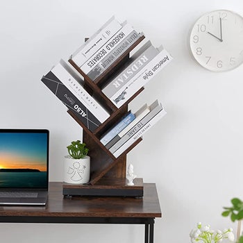 the wooden tree shelf on a desk