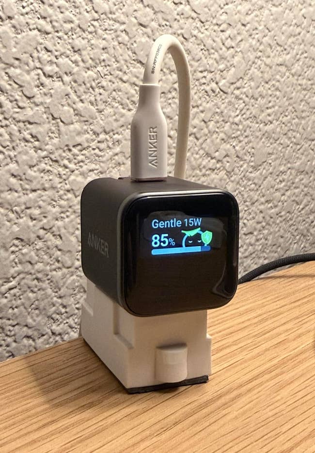 An Anker charger with a integer surface shows