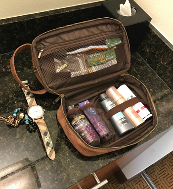 reviewer photo of the unzipped toiletry bag