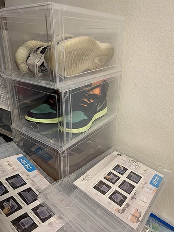 reviewer photo of three boxes with sneakers inside
