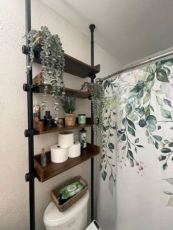 the over-the-toilet shelves successful  brown