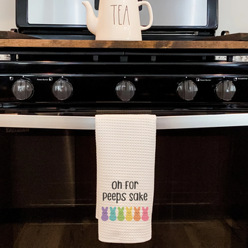 the same towel hanging from oven handle