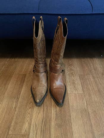 reviewer image showing faded leather boot (left) and other boot part of a pair that's shiny from the leather cleaner (right)