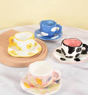 the same shape mug and saucer in several other designs