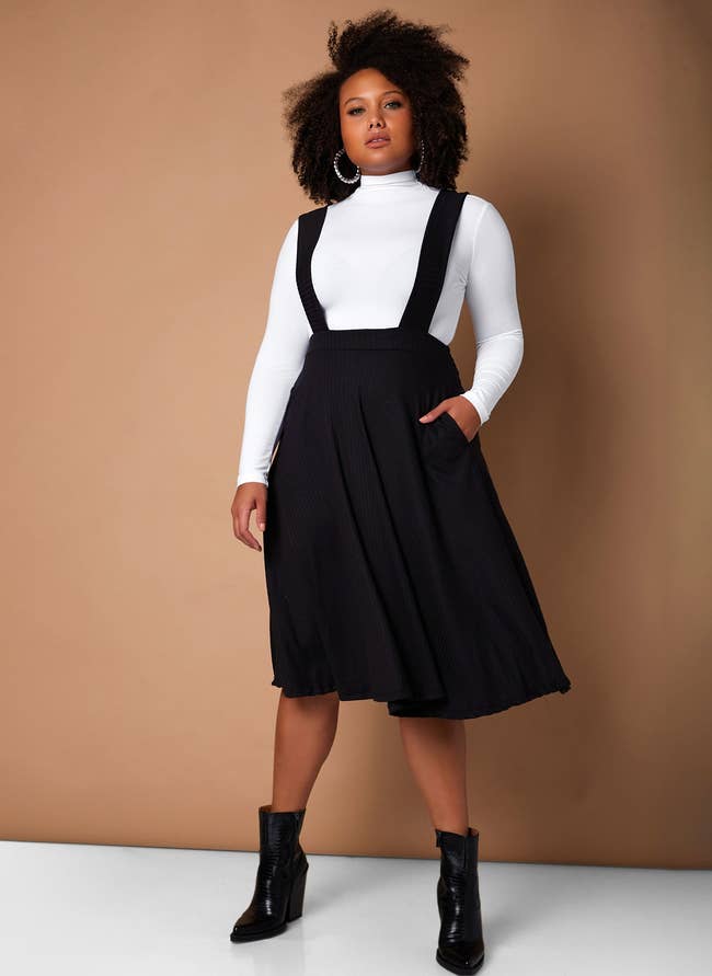 model wearing the black skirt with pockets