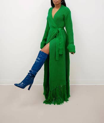 model wearing the knit dress in green