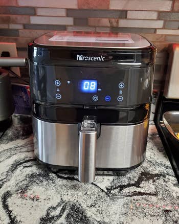 reviewer image of air fryer on countertop
