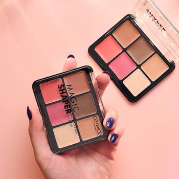 Person holding a compact constitution palette with blush and contour shades, suitable for quality buying articles