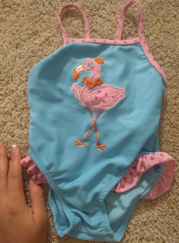 after photo of the same bathing suit, now stain free