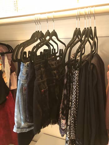Clothes being clipped connected  velvet hangers with velvet clips