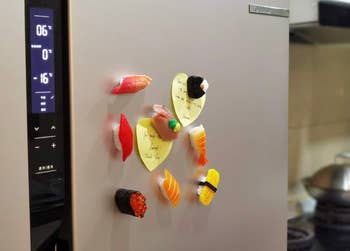 The magnets stuck onto a fridge