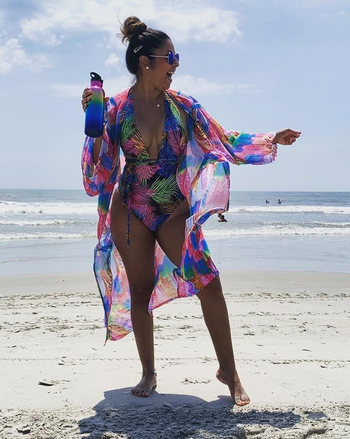 Reviewer wearing colorful coverup