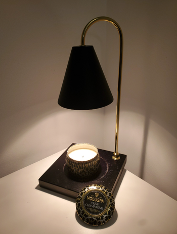 another review image of a lamp on an empty bedside table 