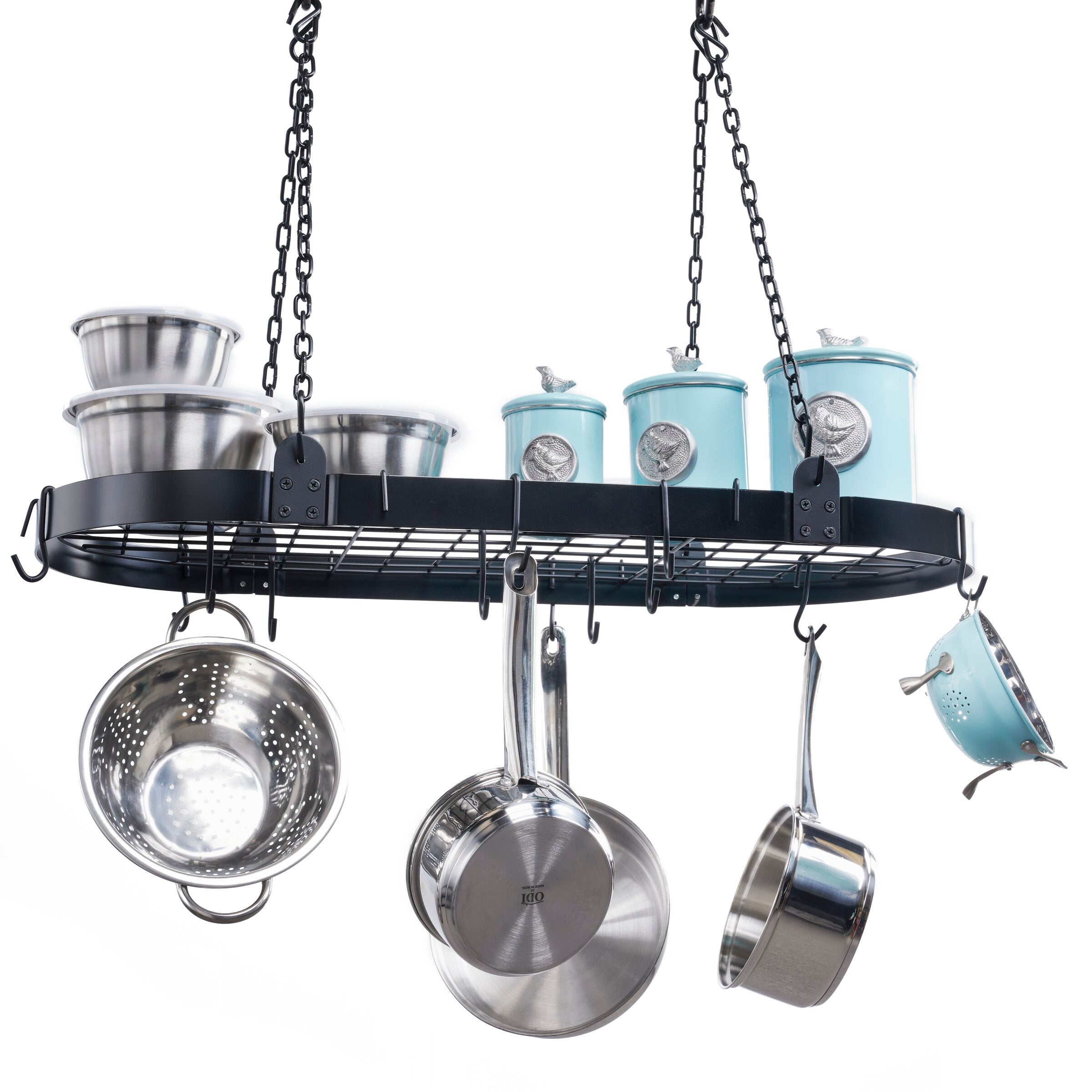 A black pot hanger with silver and blue pots hanging from it