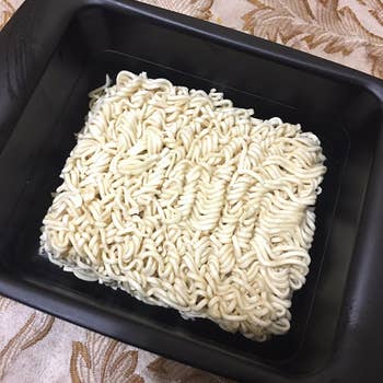 dry ramen noodles in the microwavable containers