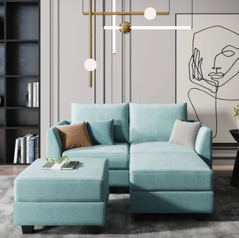 lifestyle photo of light blue modular sectional sofa with detached ottoman