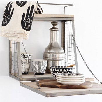 open cubby showing dishes and other kitchen items