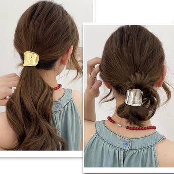 person with styled hair in ponytail and bun, wearing a denim sleeveless top, accessorized with a gold and silver hair clip and red beaded necklace
